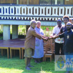 Br. Samson and Sister Neslyn receiving the chairs and tables from the builders